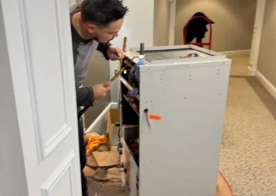 person working on heater repair